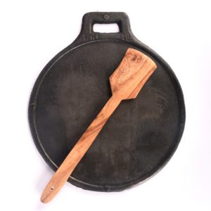 cast iron cookware and wood turner